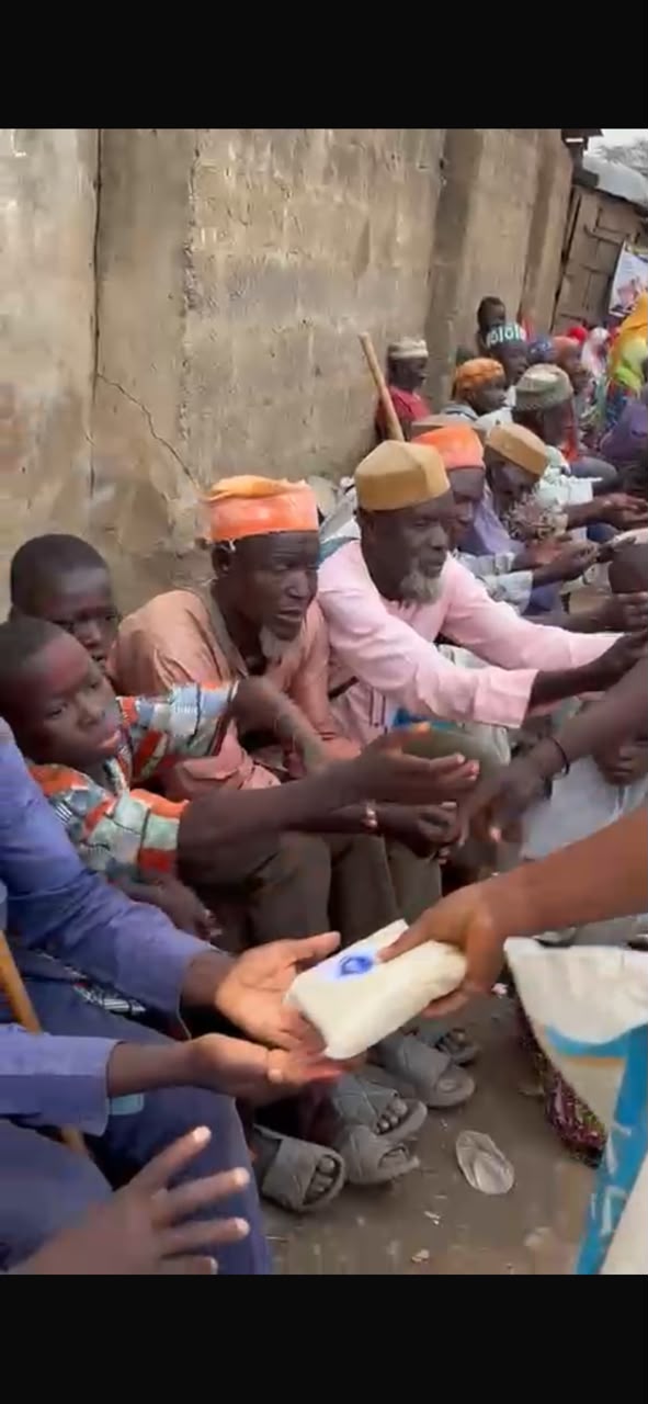 An elderly beneficiary receiving a meal